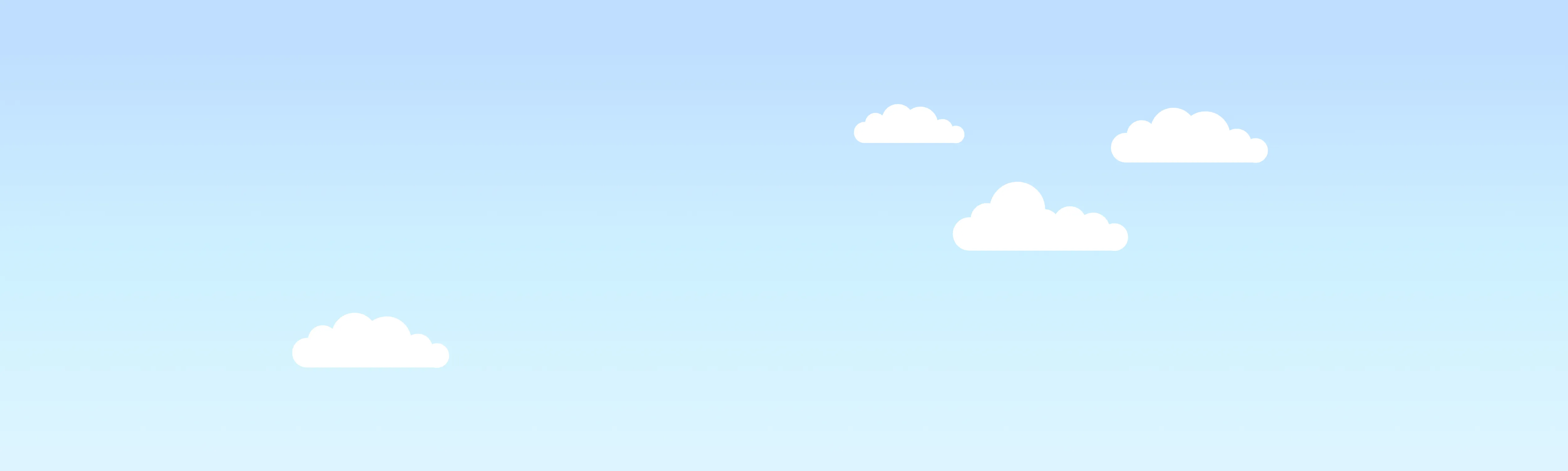 青空と白い雲が広がる空の背景